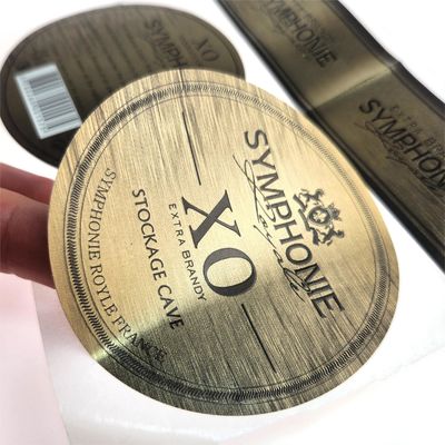 Emballage de bouteille de vin rouge haut de gamme Autocollant en vinyle avec étiquette bronzée pour jus de whisky