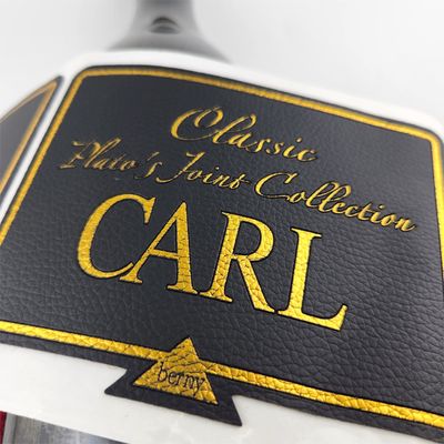 Bon prix Étiquette en cuir en PU personnalisée Impression en or en relief Étiquettes en cuir personnalisées imperméables en ligne
