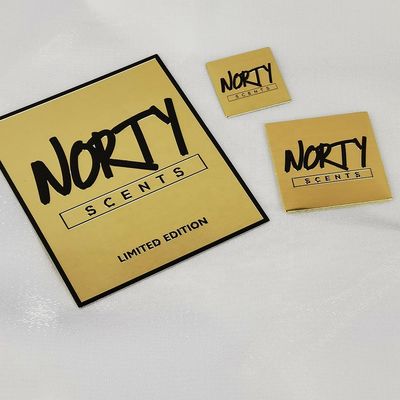 Bon prix Étiquette métallique sur mesure pour cahier de notes de parfum de nickel Transfert d'étiquette en relief 3d d'or autocollant de décal métallique en ligne