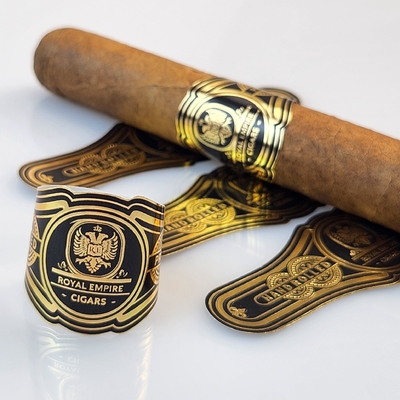 Bon prix Étiquette de cigare personnalisée de haute qualité imperméable à l'eau en vente chaude 2025, impression de feuille d'or avec logo privé et marques en relief, autocollant rapide en ligne